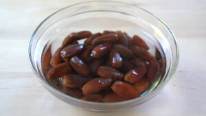 Mixing pitted dates with water